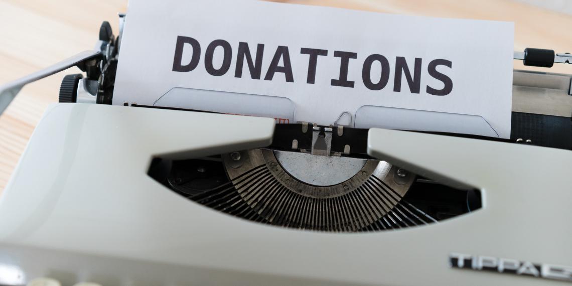 Donations text on an old typewriter