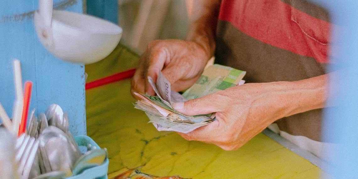Vendor counting money
