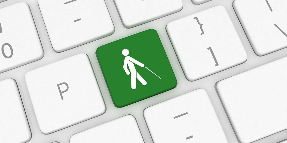 keyboard showing blind man walking on green key