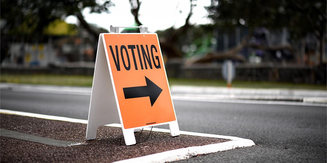 Voting sign on street