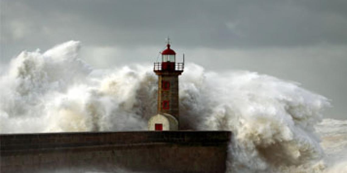 A lighthouse in a stormy sea