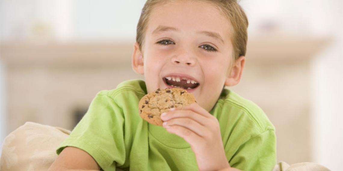 boy eating a cookie