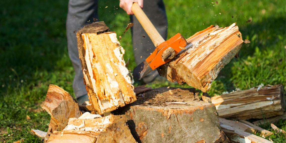 a man with an axe chopping wood
