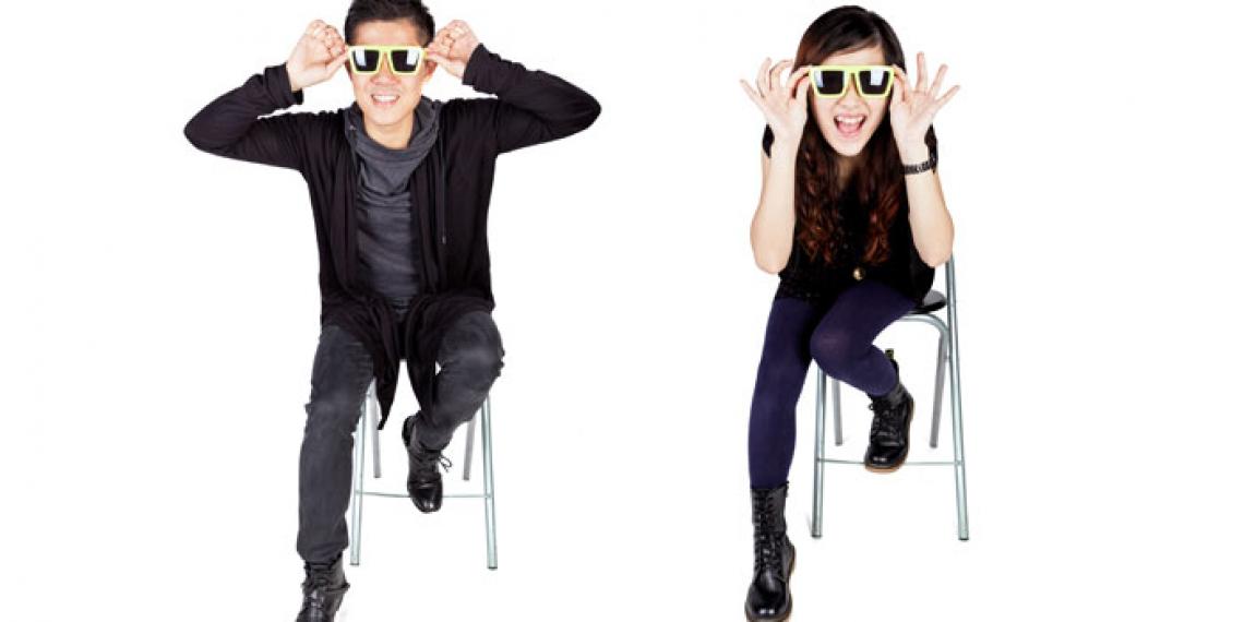 a boy and a girl wearing shades